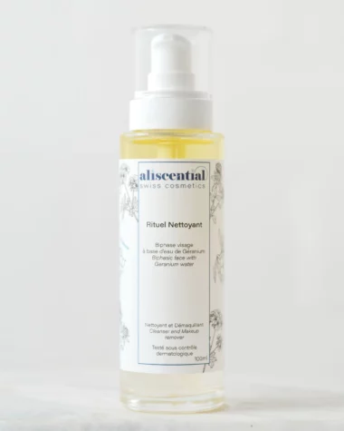 Bottle of Aliscential Rituel Nettoyant, a biphasic facial cleanser and makeup remover with geranium water to gently remove makeup and impurities.
