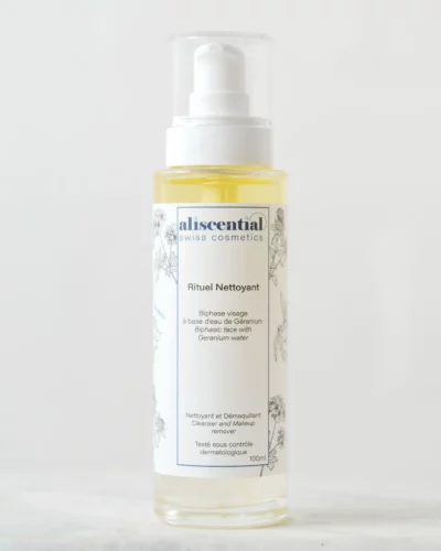 Bottle of Aliscential Rituel Nettoyant, a biphasic facial cleanser and makeup remover with geranium water to gently remove makeup and impurities.